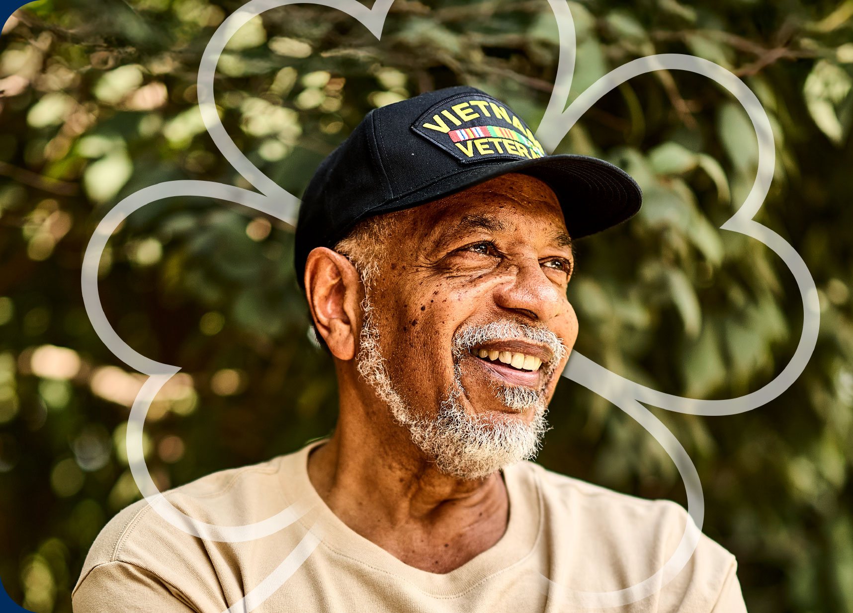 Man smiling with a clover leaf illustration