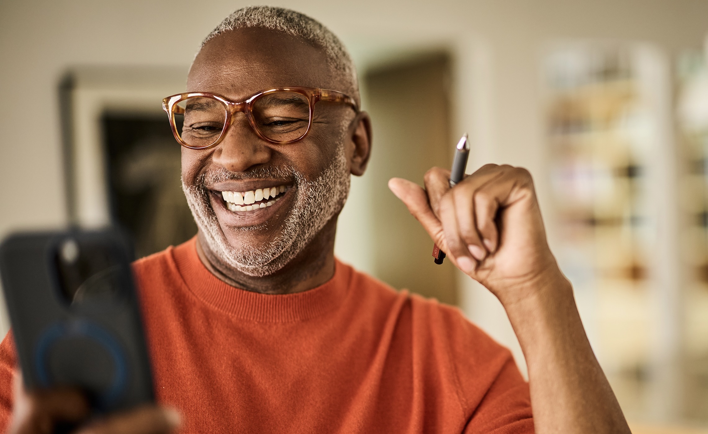 Woman smiling with a clover leaf illustration